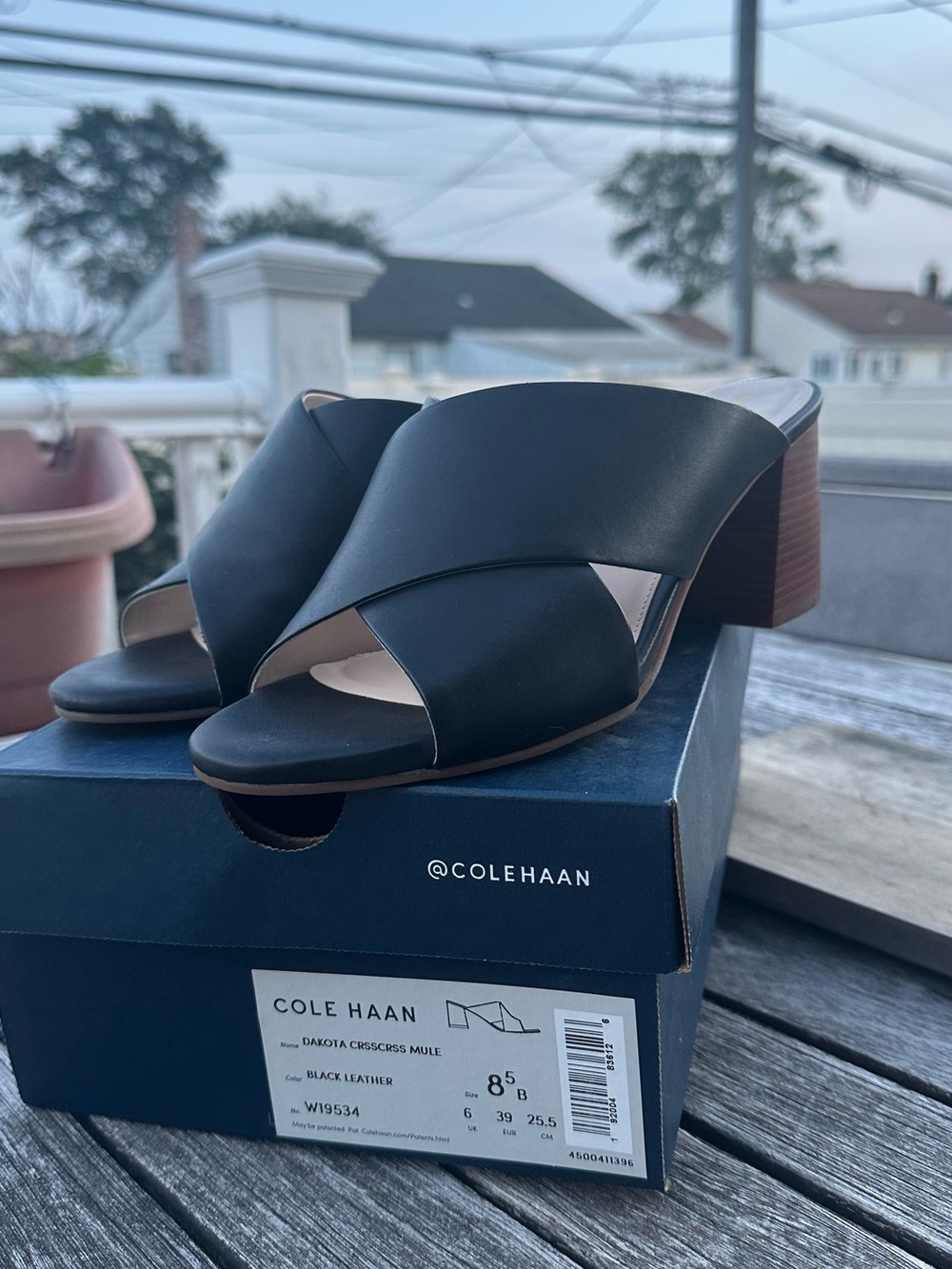 Brand new never worn Cole Haan Black Leather Crossover Mule with Stacked Heel